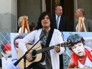 Nick Guzman opened the event with music.